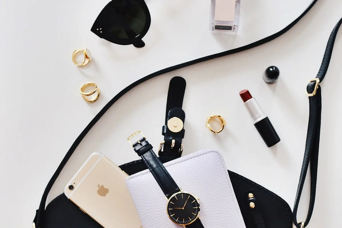Fashionable clothing accessories including bags, scarves, and fashion items