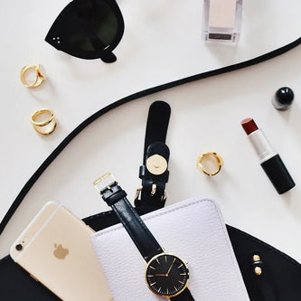 Fashionable clothing accessories including bags, scarves, and fashion items