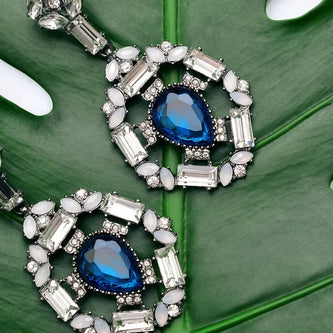 Elegant jewelry collection featuring necklaces, rings, bracelets, and earrings